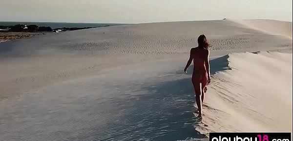  Stunning brunette lifeguard babe stripping on the beach